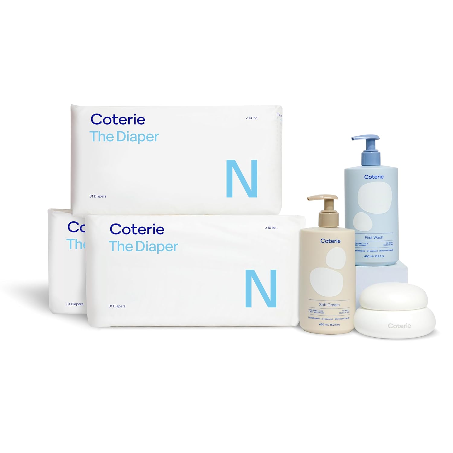 Coterie Newborn Diapers + Skin Essentials Kit (4 Piece Baby Gift Set)