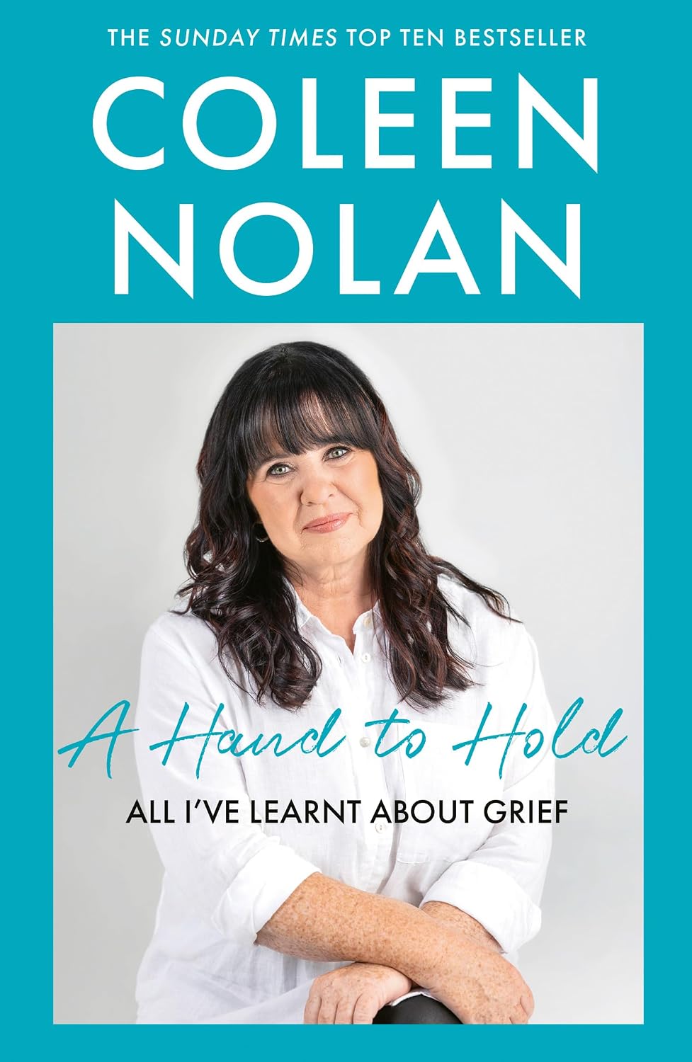 A Hand to Hold: The Sunday Times Top Ten Bestseller. A new compassionate and supportive memoir on coming to terms with loss from Loose Women’s Coleen Nolan