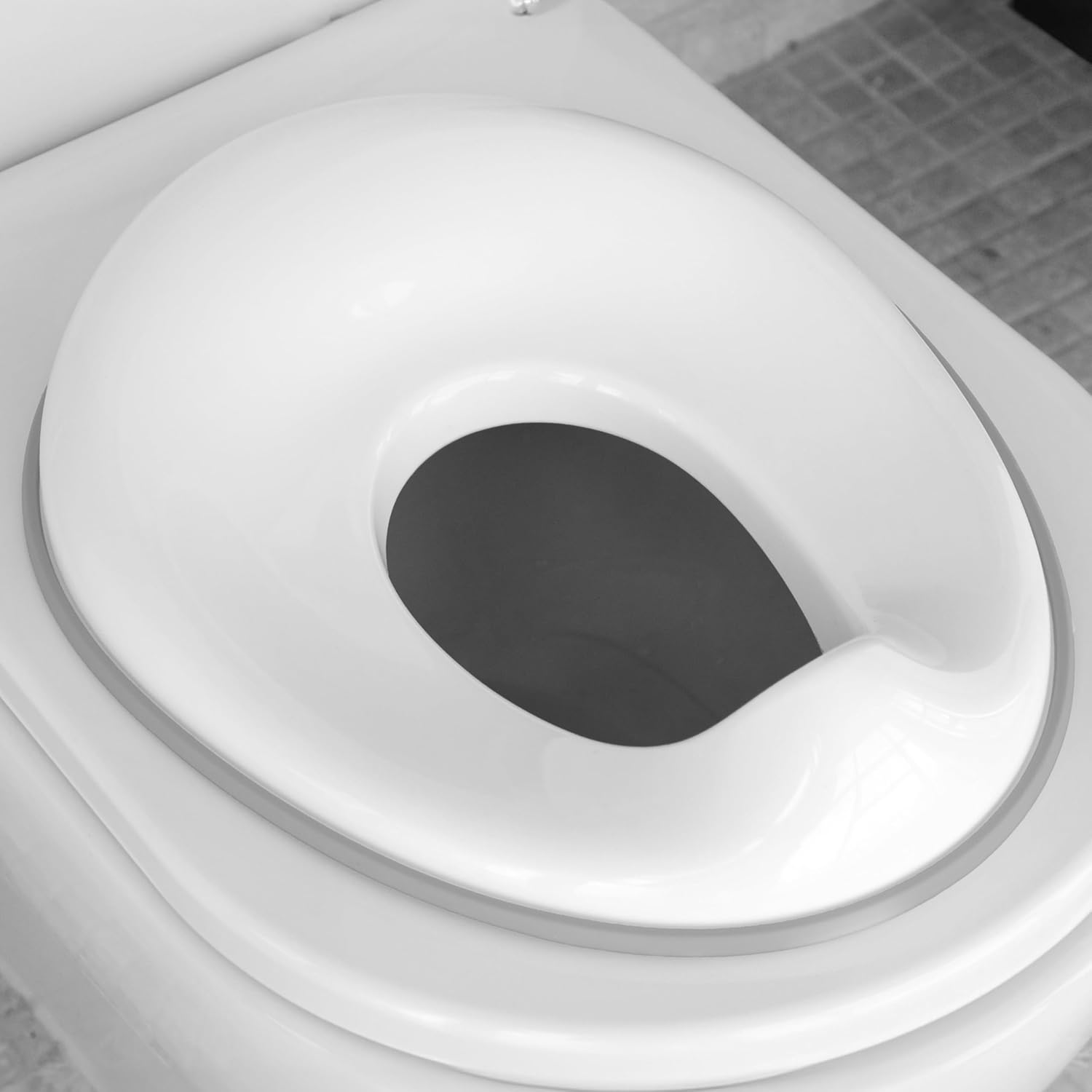 Jool Baby Potty Training Seat for Boys and Girls - Fits Round & Oval Toilets, Includes Free Storage Hook (Gray)